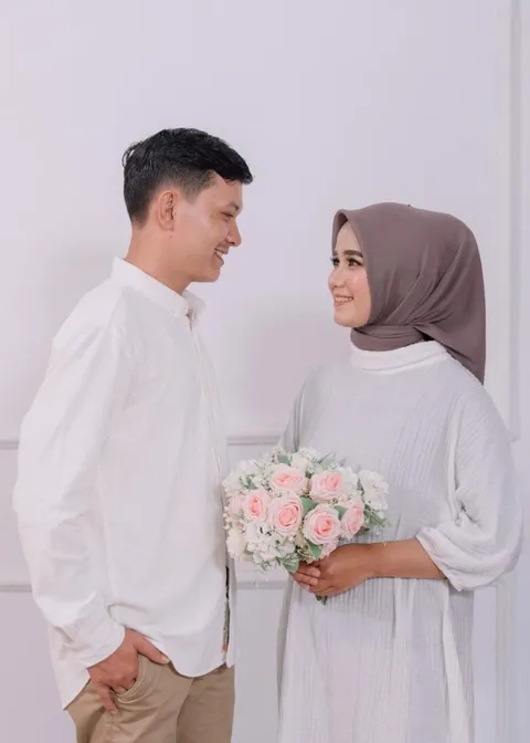 Foto sampul undangan Naura & Adit