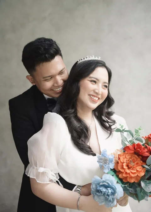 Foto sampul undangan Kharisma & Putri