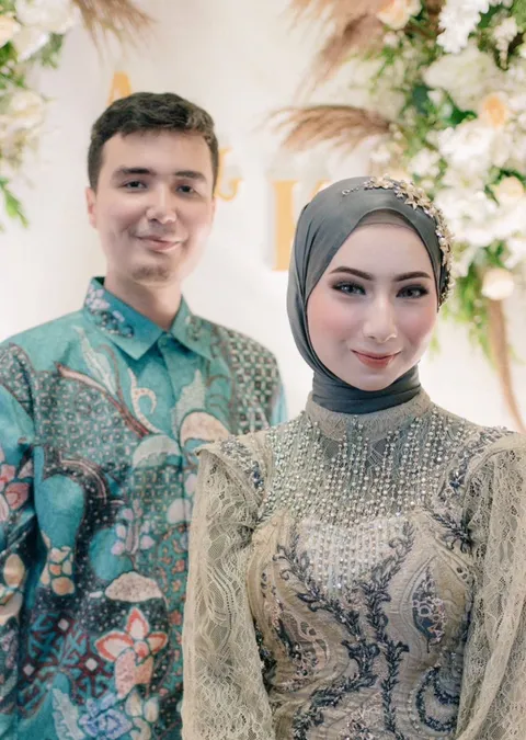 Foto sampul undangan Achmad & Keisha